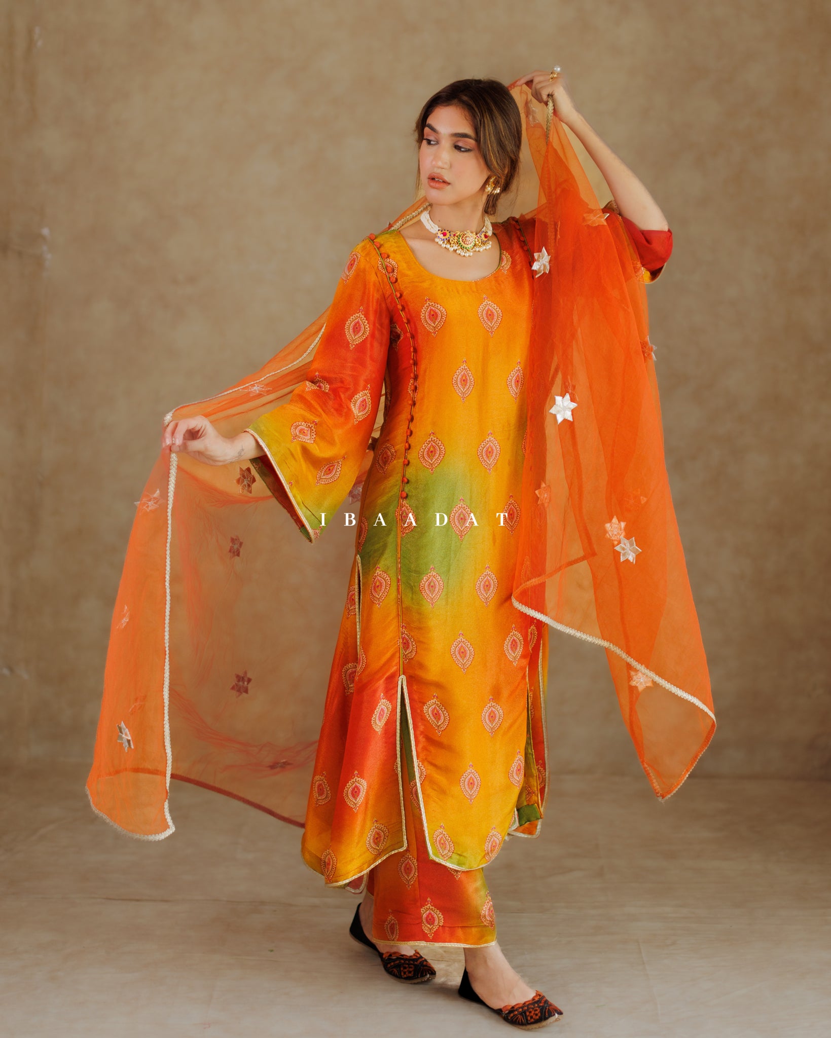 Elegant Orange Yellow Salwar Suit with Gotta Work