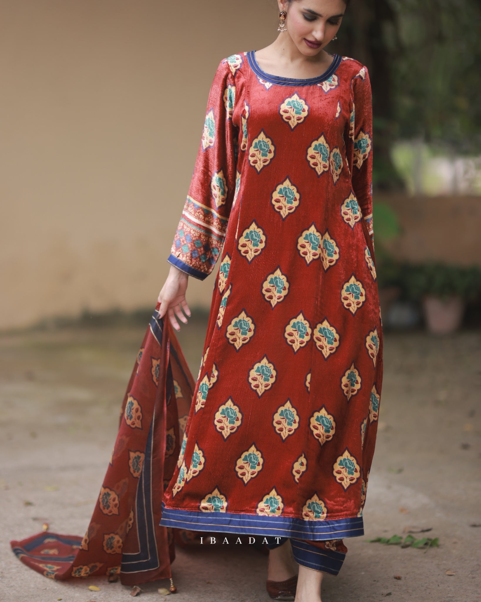Elegant red velvet Punjabi salwar suit for festive wear