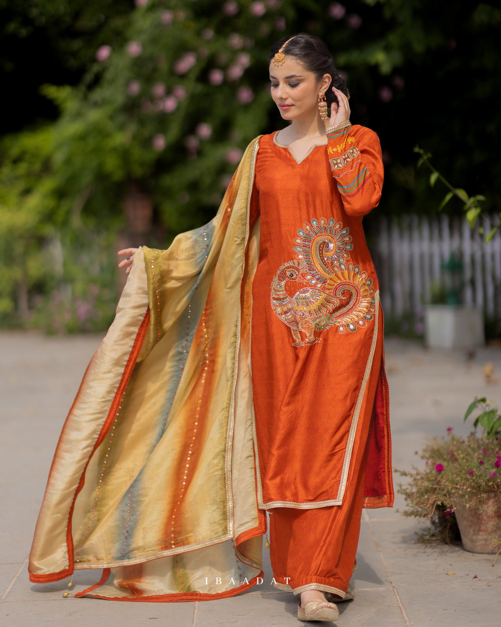 Elegant rust raw silk Punjabi salwar suit with embroidery