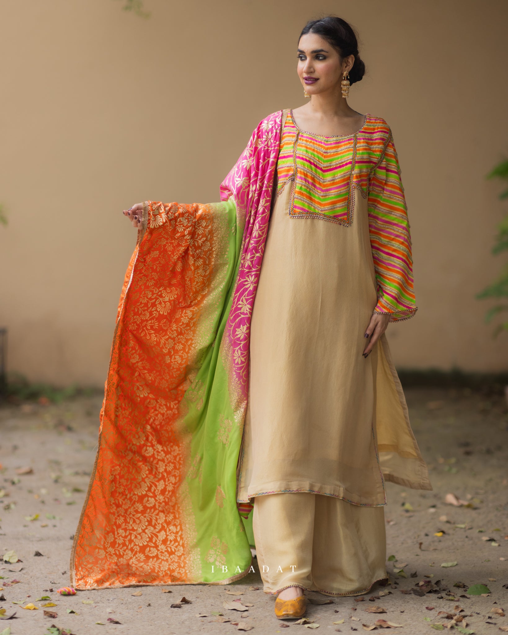 Nainaa Silk Punjabi salwar suit in gold color