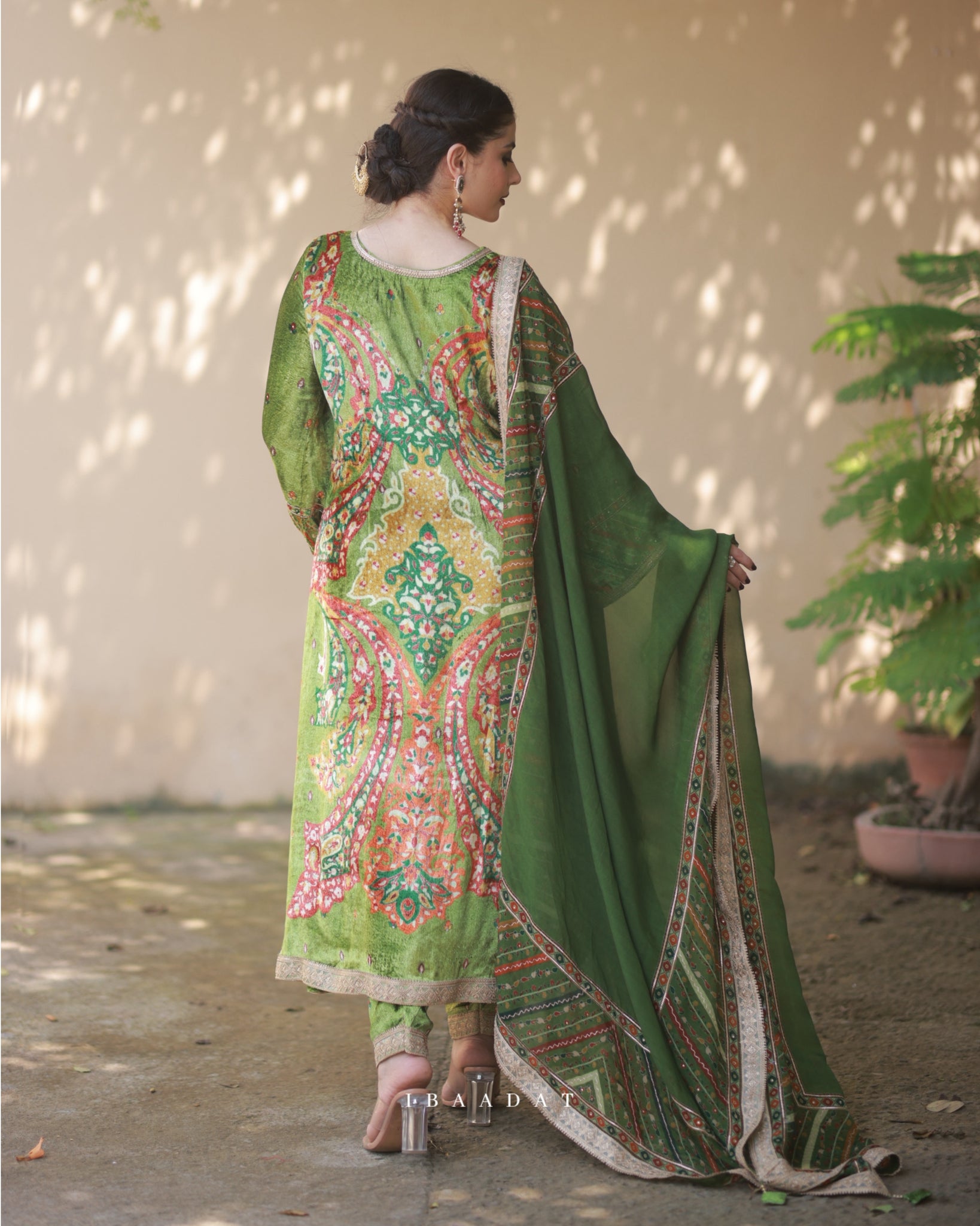 Premium printed red and green salwar suit for festive wear