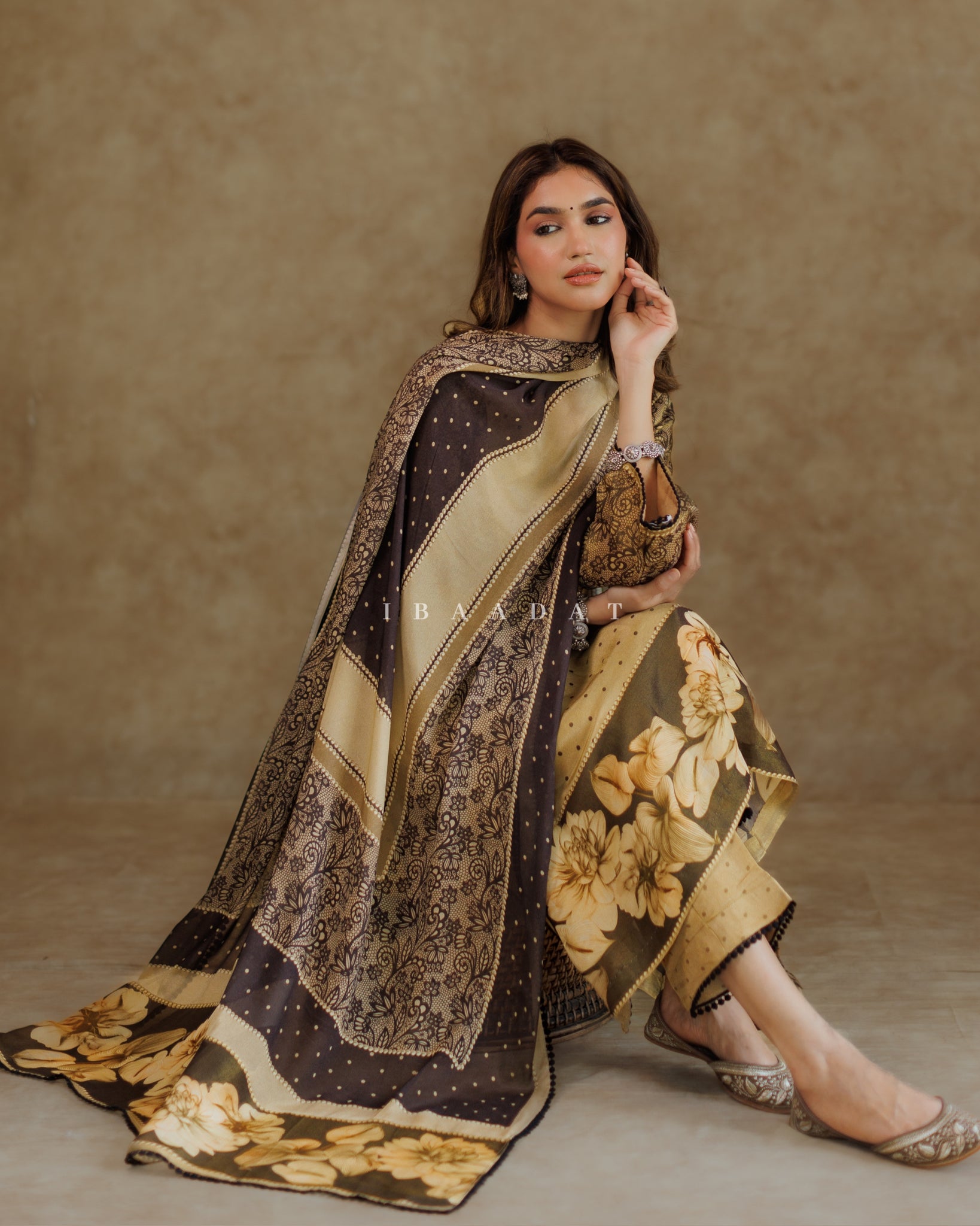 Premium silk gold Punjabi suit with lacework for special occasions