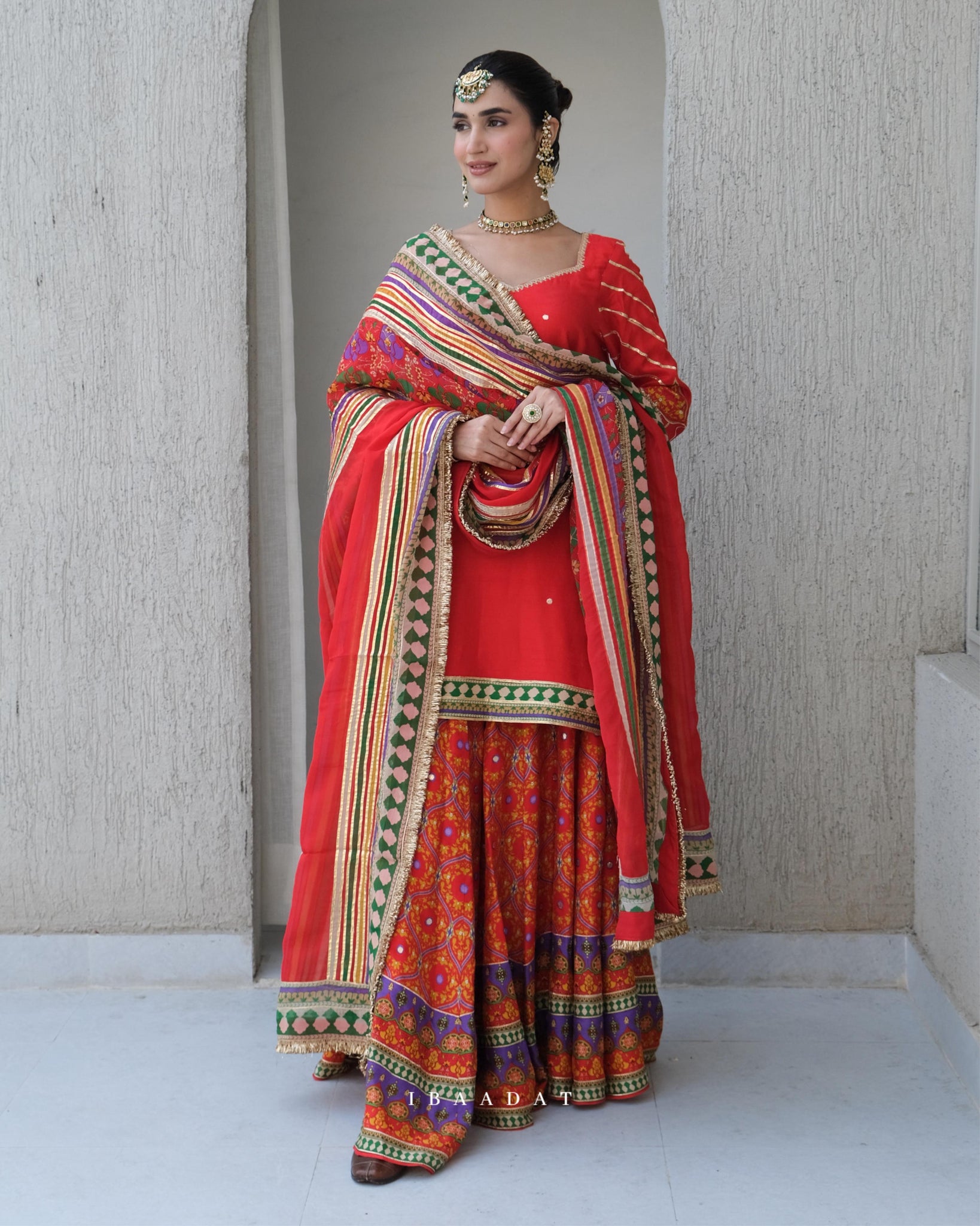 Silk Anarkali suit with matching embroidered organza dupatta