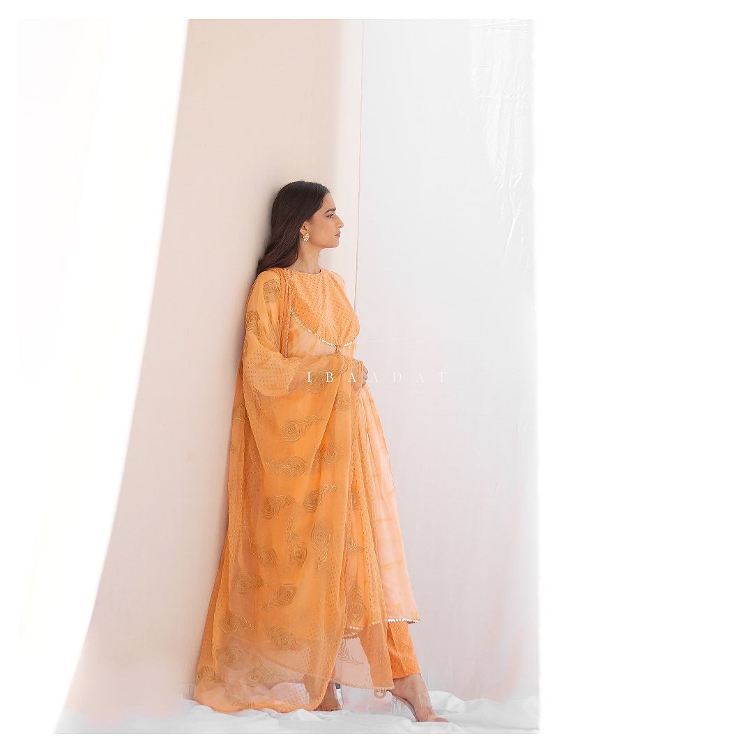 Peach printed Gharara suit with festive look