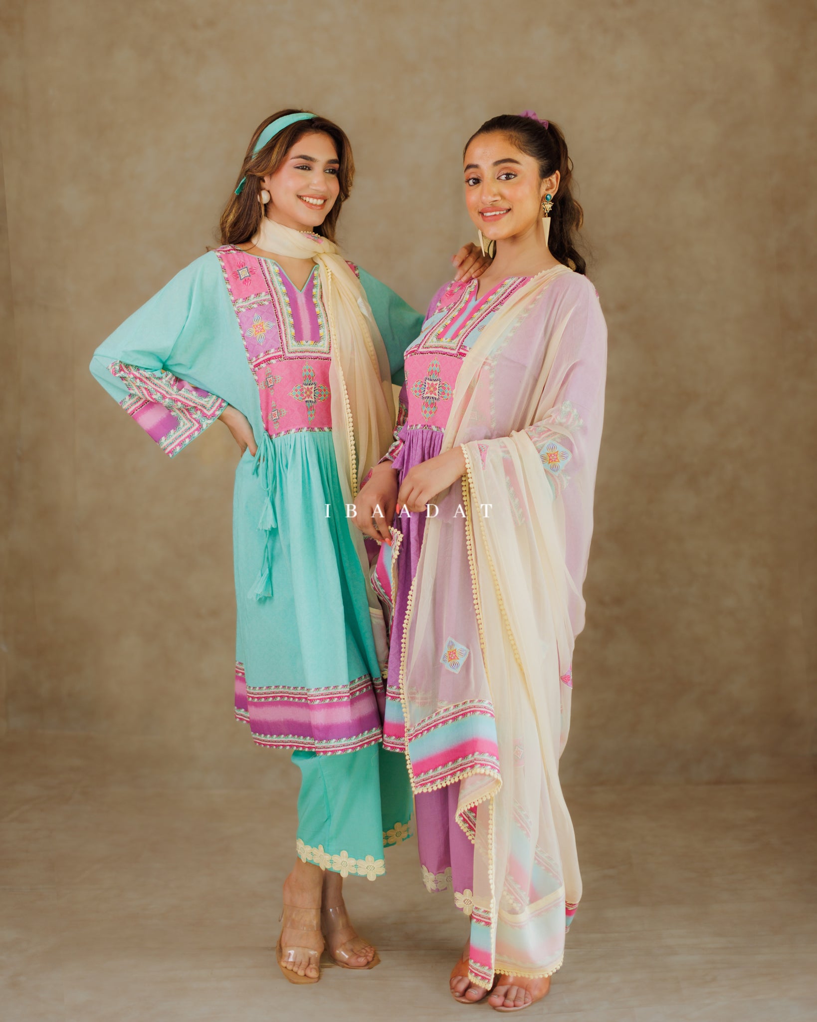 Purple and aqua blue Manchali printed salwar suits collection