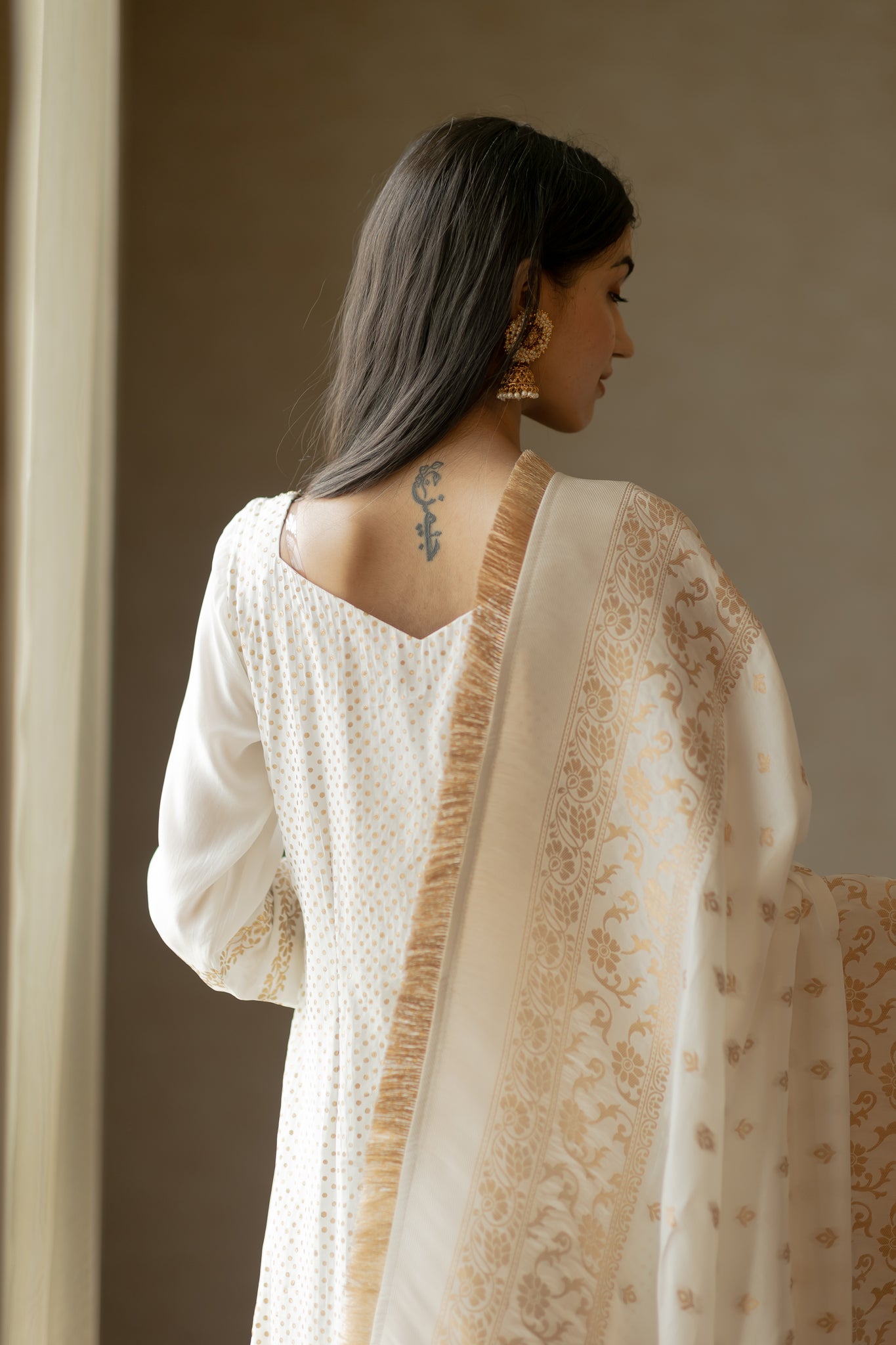 Stylish white and gold Punjabi suit for women