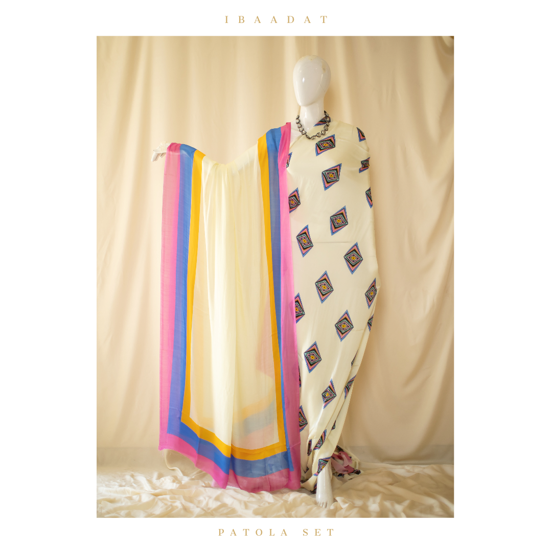 White Patola detailing on black Punjabi suit