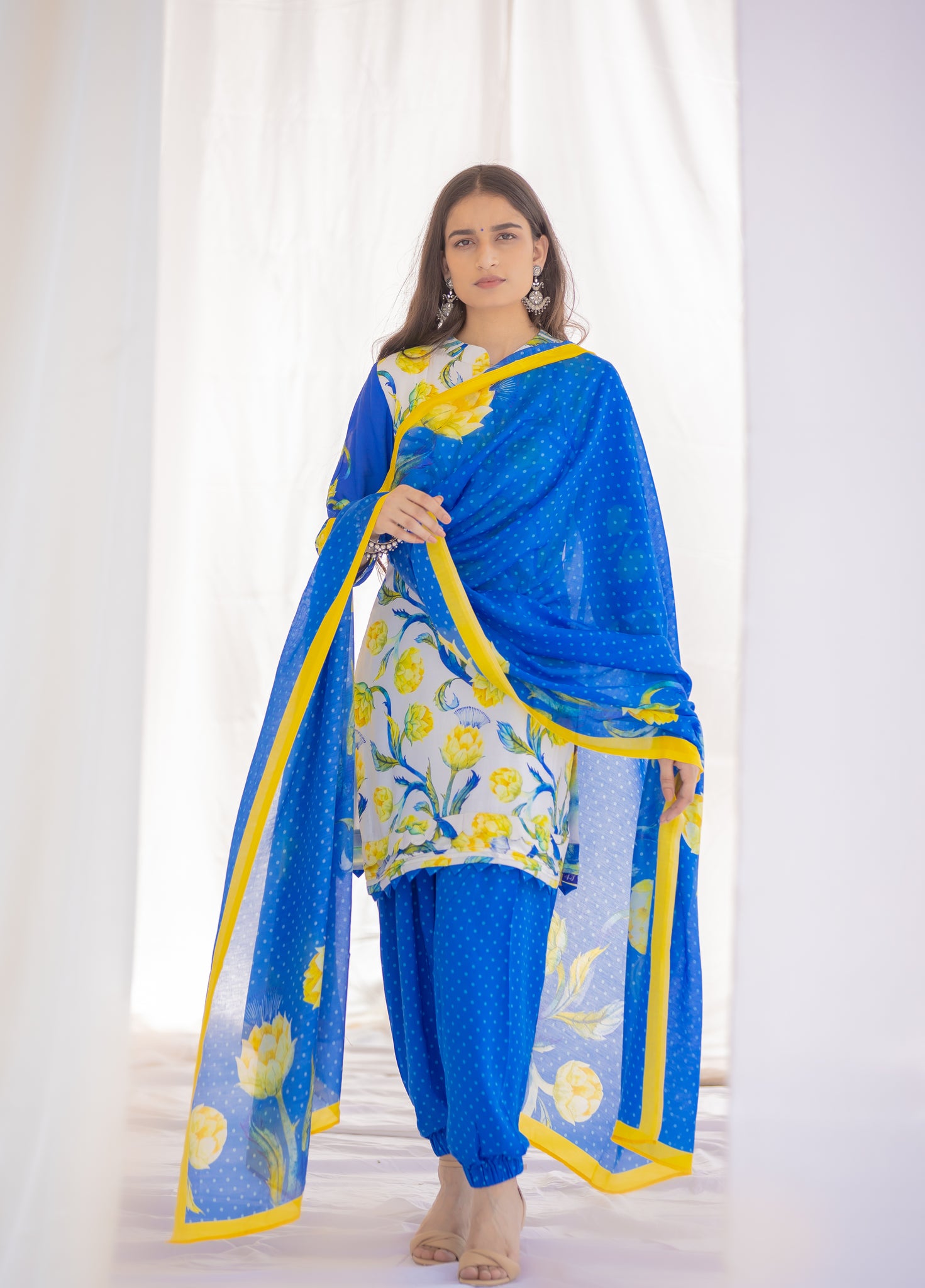 White and Blue Printed Cotton Salwar Suit with Floral Design